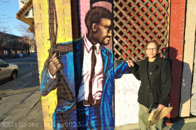 Marcus Books owner Blanche Richardson standing with Malcolm X. Photo by Eric Arnold.