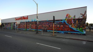 CRP's 'Peace and Dignity' mural on a Smart & Final building on Int'l Blvd in the tagging-plagued Fruitvale district" has remained untouched for three years.