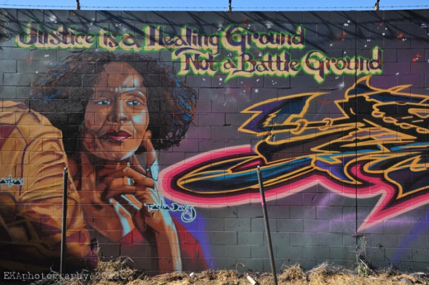 Restorative Justice for Oakland Youth founder, Fania Davis, is honored on 5th St near Market. This location, previously a hotspot for vandalism, has remained untouched since CRP placed a mural honoring local heroes there. 