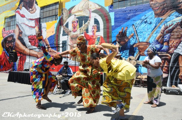Diamano Coura perform at the Alice St. Mural dedication block party